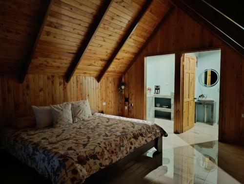 Postel nebo postele na pokoji v ubytování Cabaña El Trogon