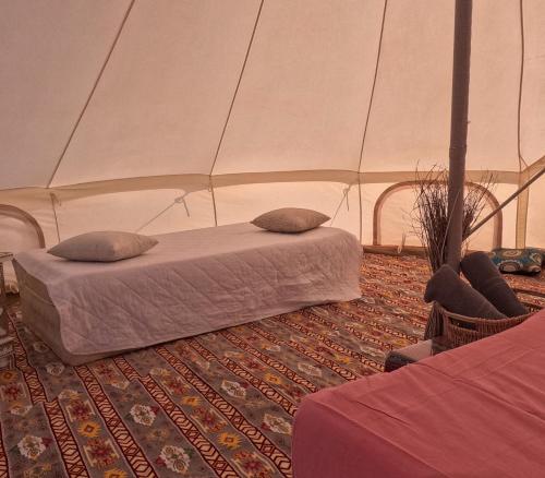 Ένα ή περισσότερα κρεβάτια σε δωμάτιο στο ShootingStar Private Camp