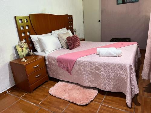 Postel nebo postele na pokoji v ubytování Casa Paraíso, céntrica y con estacionamiento