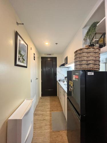 Een keuken of kitchenette bij J&J Havenstay Ananda Square