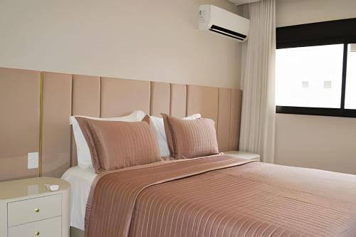 Ένα ή περισσότερα κρεβάτια σε δωμάτιο στο 3 Luxury Suites + Sophistication