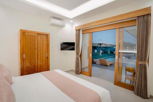 Ένα ή περισσότερα κρεβάτια σε δωμάτιο στο Bali Jepun Villa 2BR private pool villa nearUbud