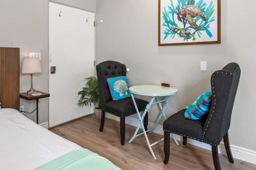 Ένα ή περισσότερα κρεβάτια σε δωμάτιο στο Seaglass Studio