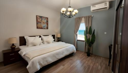 Postel nebo postele na pokoji v ubytování Roushan Resort