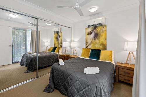 Ένα ή περισσότερα κρεβάτια σε δωμάτιο στο Beach Breeze Holiday House