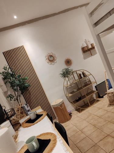 Posezení v ubytování Appartement romantique avec jacuzzi