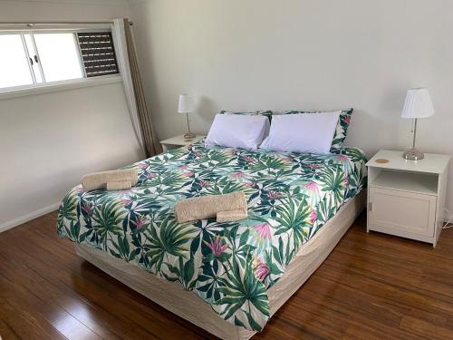 Ένα ή περισσότερα κρεβάτια σε δωμάτιο στο Allawah at Wamberal