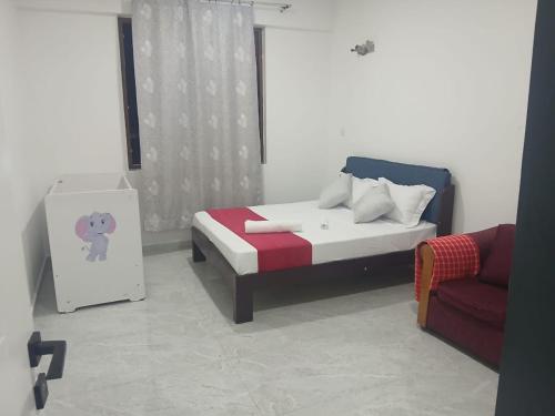 Ένα ή περισσότερα κρεβάτια σε δωμάτιο στο Rbella Haven