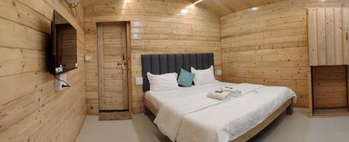 Postel nebo postele na pokoji v ubytování Raapan Beach Resort