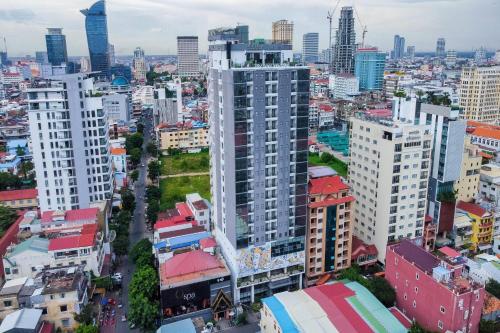 an aerial view of a city with tall buildings at Poulo Wai Hotel, Trademark Collection by Wyndham in Phnom Penh