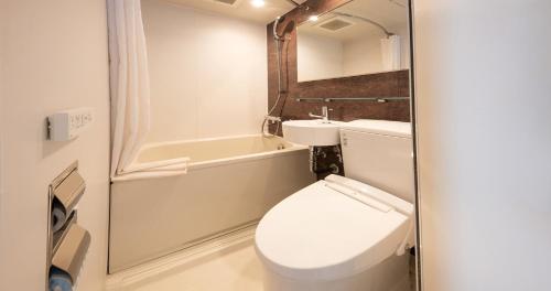 Un baño de QuintessaHotel Osakaumeda Comic&Books