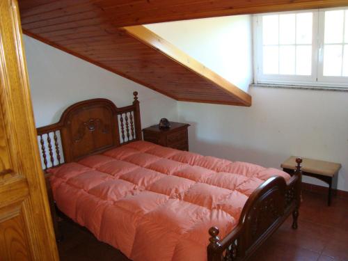 Ένα ή περισσότερα κρεβάτια σε δωμάτιο στο Casa do Xastre