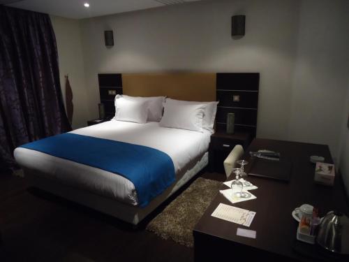 Cama o camas de una habitación en Hotel Emilio Moretti