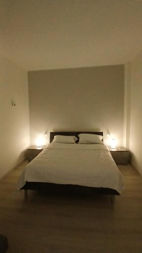 En eller flere senge i et værelse på MilanoValery3