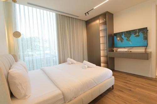 Ένα ή περισσότερα κρεβάτια σε δωμάτιο στο AH 4 Bedroom Penthouse with Private Pool