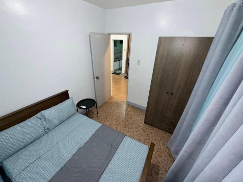 Postel nebo postele na pokoji v ubytování J and J Transient House