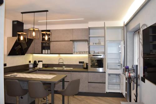 Kuchyň nebo kuchyňský kout v ubytování Baita Valtellina -Relax nel cuore delle alpi-