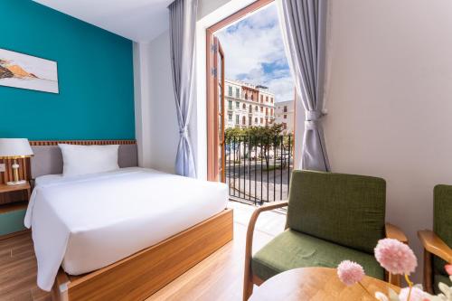 Ένα ή περισσότερα κρεβάτια σε δωμάτιο στο Mimosa Hotel Phú Quốc