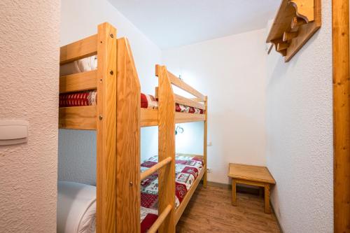 Ένα ή περισσότερα κρεβάτια σε δωμάτιο στο A2 309 Appart au pied des pistes