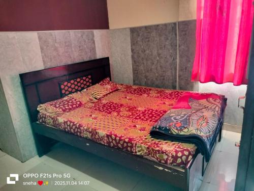 Postel nebo postele na pokoji v ubytování hotel daksh