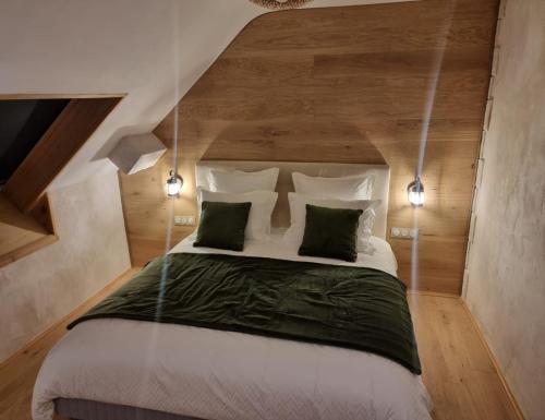 Ένα ή περισσότερα κρεβάτια σε δωμάτιο στο Suite luxueuse et bien être Le refuge