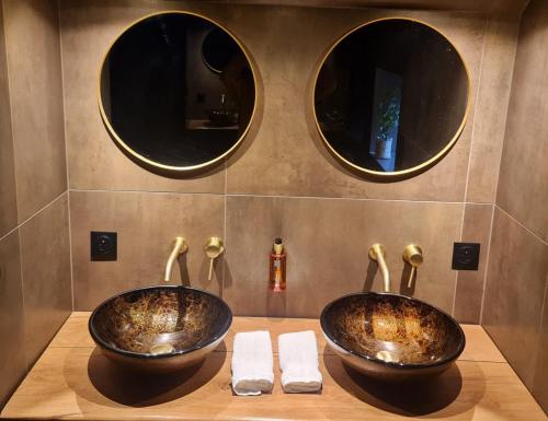 Φωτογραφία από το άλμπουμ του Suite luxueuse et bien être Le refuge σε Breuches