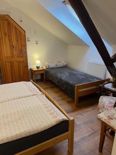 Postel nebo postele na pokoji v ubytování Apartmán Bechyně