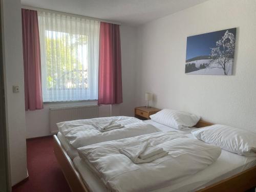 Postel nebo postele na pokoji v ubytování Hotel Zum Alten Brauhaus