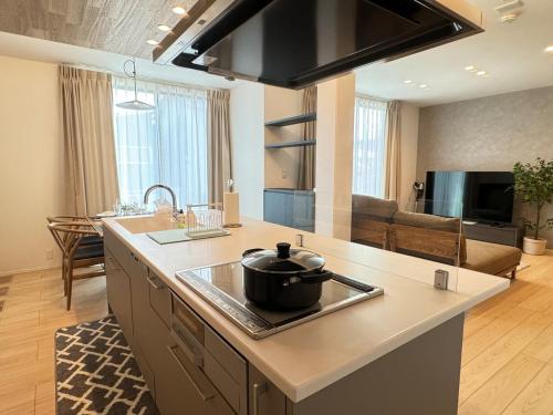 Η κουζίνα ή μικρή κουζίνα στο Akikawa Mashiki 3