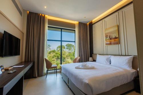 Postel nebo postele na pokoji v ubytování CherryLoft Luxury Resort