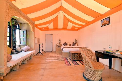 Postel nebo postele na pokoji v ubytování The Desert Gateway Resort