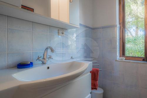 Koupelna v ubytování Casa Pavel a Colle di Lido - Goelba