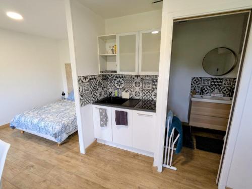 Postel nebo postele na pokoji v ubytování LE CHARME D OGNES