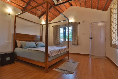 Postel nebo postele na pokoji v ubytování Gonakal Homestay