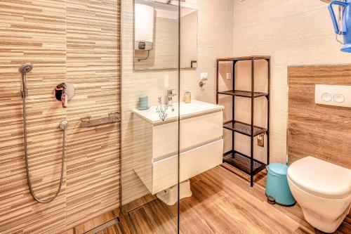Et badeværelse på Apartments Medna