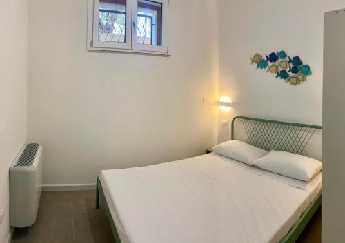 Ένα ή περισσότερα κρεβάτια σε δωμάτιο στο Thilimba Holiday Home