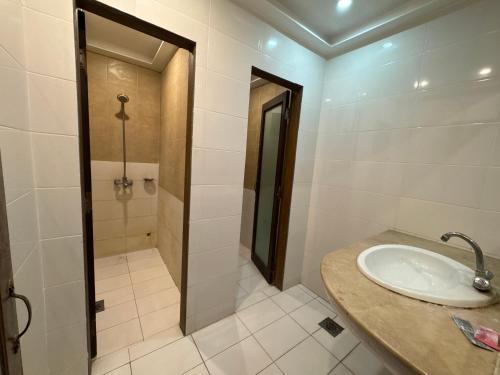 Koupelna v ubytování Hotel Golden Tree