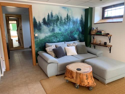 Posezení v ubytování Eco-Gîte "La Chouette Verte"