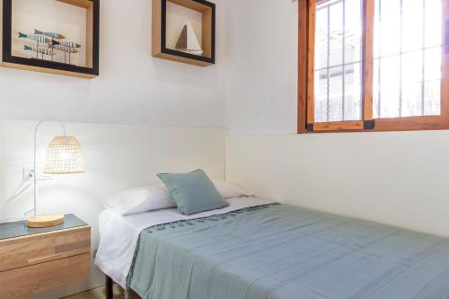 Ένα ή περισσότερα κρεβάτια σε δωμάτιο στο Playa Oliva Jessica