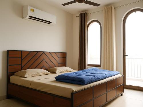 Ένα ή περισσότερα κρεβάτια σε δωμάτιο στο STAY ROTAL VILLA BNB 1st F