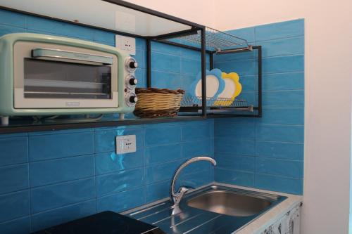 Kuchyň nebo kuchyňský kout v ubytování Le Barchette