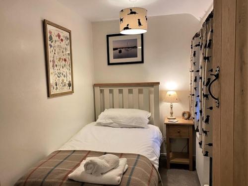 Voodi või voodid majutusasutuse 2 Bed in Holt NCC44 toas