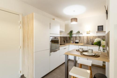 Kuchyň nebo kuchyňský kout v ubytování La Terrasse de Duranne