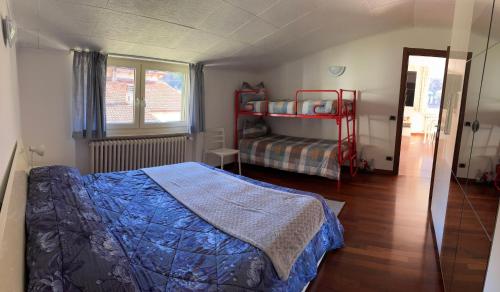 Postel nebo postele na pokoji v ubytování Miralago Casa Vacanze