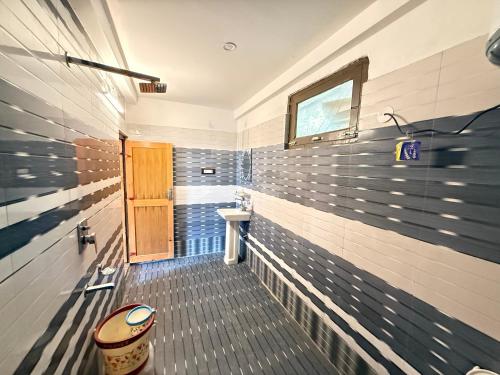 Koupelna v ubytování Yellowjackets Hostel Tosh