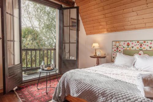 Ένα ή περισσότερα κρεβάτια σε δωμάτιο στο Los Arces