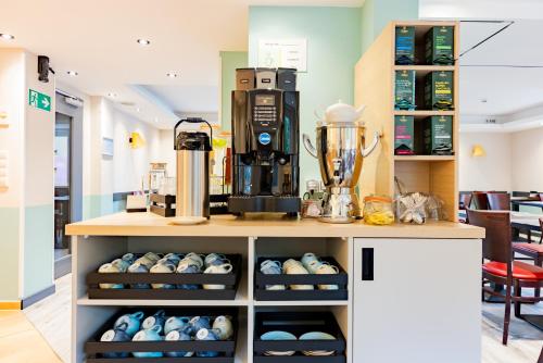 Принадлежности для чая и кофе в Garner Hotel Bremen North by IHG