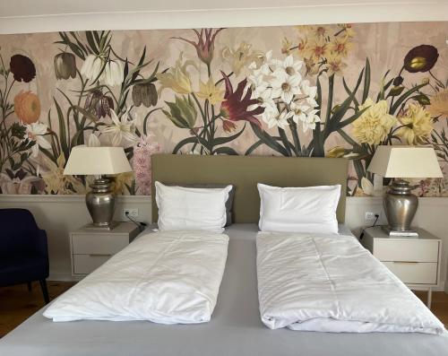 Postel nebo postele na pokoji v ubytování Alwine - Landhaus an den Spreewiesen