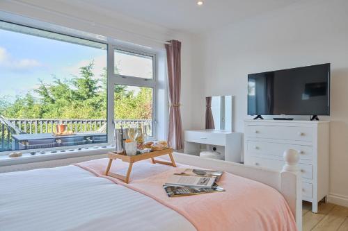 Postel nebo postele na pokoji v ubytování Sunset View