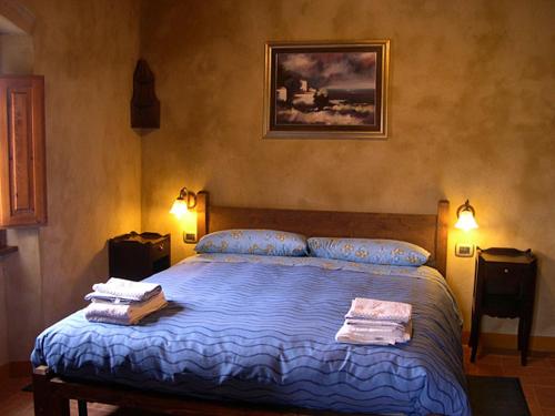 Postel nebo postele na pokoji v ubytování Borghetto Di San Filippo